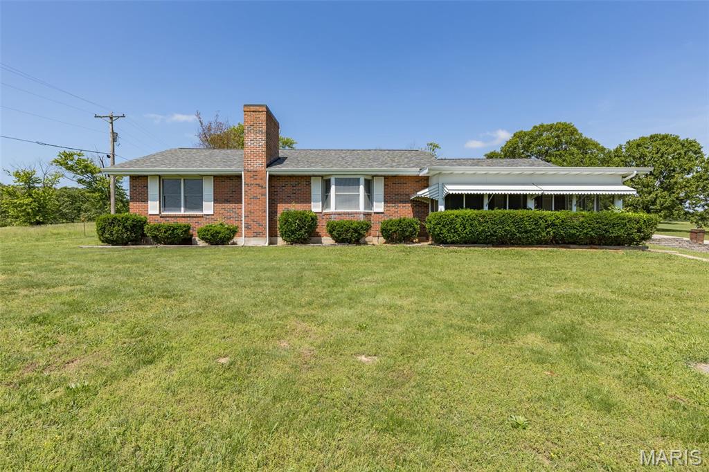 Discover a unique opportunity at 3220 Baisch DR,DeSoto, MO. This single-family residence offers a distinctive living experience for those seeking a home with character and potential. This private home on private 2.04 acres- has so much to offer. Open to nice large living room with Primary suite to the right-Primary suite is a nice large room with en suite bathroom. To the left of living room are bedrooms 2 and 3 offering nice sized rooms and a hallway full bathroom. Separate dining room is large and off the kitchen- great kitchen with lots of cabinetry and space for eat in breakfast table. Main floor laundry and a half bath finish off the main floor- out the back the old swimming pool was filled in to offer new home owners a fenced in back yard area with concrete patio with tons of open acreage remaining. Back inside the lower level offers a full unfinished area for you to make your own. The home's roof, siding, soffit, gutters and downspouts are all only 1 year old. HVAC is a 1 year new Heat pump- so much to see!