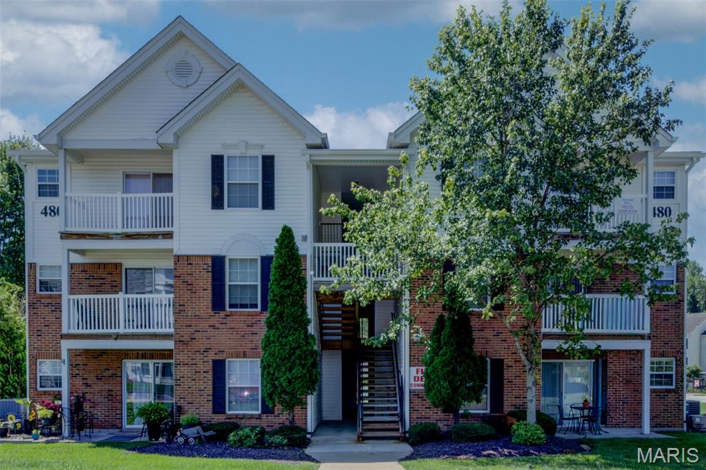 Welcome to this easily-maintained condominium offering comfortable, low-maintenance living in a convenient St. Peters location.  This inviting home features a functional split-bedroom floor plan, abundant natural light, and a private balcony - the perfect spot to enjoy your morning coffee or unwind at the end of the day.  The kitchen offers ample cabinet and counter space with an efficient layout designed for everyday living.  The spacious primary suite includes a walk-in closet and private full bath, while the secondary bedroom features built-in shelving, making it ideal for a home office, guest room, or additional storage.  This home also comes with a designated carport space (#39) to the South of the building AND a storage closet across the hall from the front door.  Enjoy community amenities including a swimming pool and playground, while being just minutes from shopping, dining, parks, the YMCA, and major highways.  The monthly HOA fee includes water, sewer, and trash services, adding even more value and convenience.  Schedule your private showing today and see all this charming home has to offer!