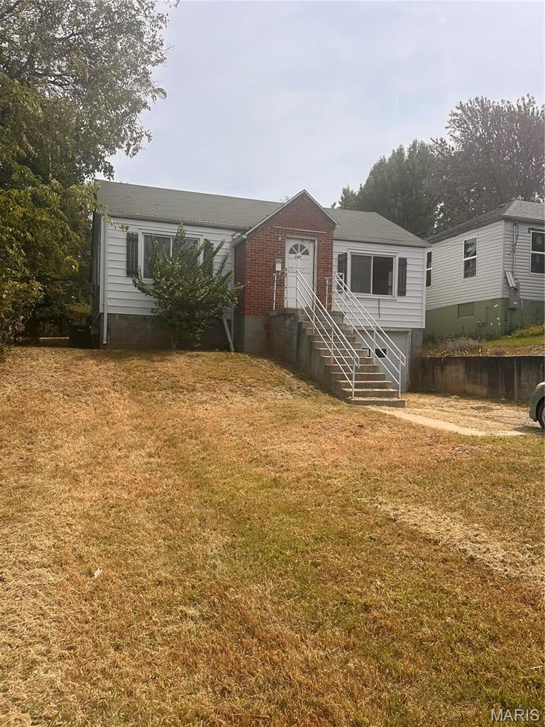 INVESTOR & RENOVATION OPPORTUNITY IN JEFFERSON CITY! Located in the heart of Jefferson City, this 3-bedroom, 1-bath, two-story home offers plenty of potential for someone looking to take on a substantial renovation project. The property is being offered AS-IS, and the list price reflects the home’s current condition and the work that may be needed.

The main living area is located upstairs, while the lower level provides an unfinished basement and attached garage. Outside, the home sits back from the street, providing a little extra separation from the road along with both front and back yard space. The backyard offers additional outdoor potential in an established city setting.

Whether you’re an investor looking for your next project or a buyer seeking an opportunity to renovate and make a property your own, this home is worth a look. Extensive rehabilitation will be needed before the home is suitable for occupancy. Buyers are encouraged to conduct their own inspections and due diligence regarding the condition, improvements, utilities, and any necessary repairs.

Property is being sold AS-IS. Seller will not be making repairs.