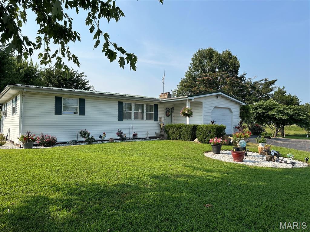 YOUR OWN LITTLE SLICE OF HEAVEN AWAITS!!! This beautifully updated 2-bedroom, 1-bath home offers the perfect blend of comfort, charm, and outdoor living. Inside, you’ll appreciate the updated interior, efficient NEW HVAC, and a fully equipped kitchen with all appliances included, making this home truly move-in ready. The full basement offers endless possibilities for future expansion, providing the opportunity to create additional living space, a family room, home office, or recreation area. Step outside and discover your own private retreat! The fenced backyard is designed for entertaining and relaxation, featuring an above-ground pool with a spacious deck, a patio area, and beautifully landscaped grounds that create a peaceful, park-like setting. The detached two-car garage includes an excellent man cave, workshop, or hobby space, perfect for projects, storage, or gatherings. An asphalt driveway provides plenty of parking for family and guests. This property offers the perfect combination of indoor comfort and outdoor enjoyment. Don’t miss your opportunity to own this must-see home—schedule your private showing today!