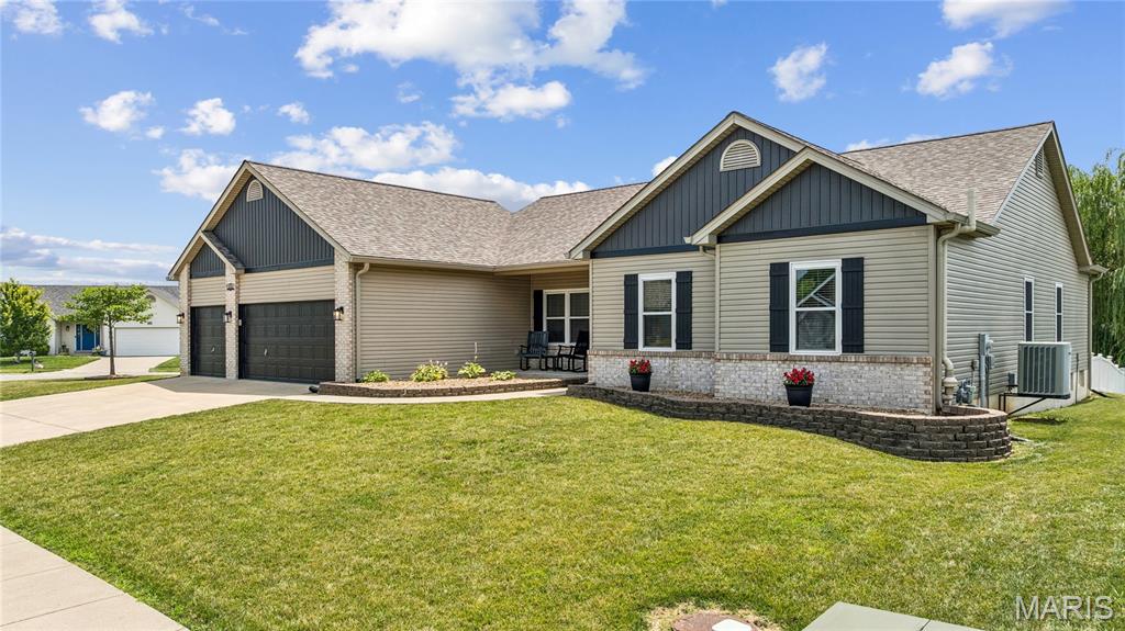 Welcome to 800 Mule Creek Drive in Wentzville! This beautifully maintained 3-bedroom, 2.5-bath ranch checks every box, with major updates already done for you — new roof, windows replaced in 2022, new kitchen appliances, and durable new LVP flooring throughout.
Step inside to soaring vaulted ceilings and an open-concept layout that flows effortlessly from the foyer into a bright dining nook, spacious kitchen, and inviting living room anchored by a cozy gas fireplace. The kitchen offers warm wood cabinetry, generous granite counters, and a center island with seating — ideal for busy mornings or weekend gatherings.
The primary suite is a true retreat, featuring a dramatic tray ceiling, a spacious walk-in closet, and an en-suite bath with dual sinks, a jetted soaking tub, and a separate glass shower. Two additional bedrooms offer flexibility for family, guests, or a home office, and a dedicated laundry room adds everyday convenience.
Out back, your own private oasis awaits: a fully fenced yard with an above-ground pool, a covered patio with retractable shades, and plenty of room to entertain all summer long.
With a spacious 3-car garage, established landscaping, and a friendly Wentzville neighborhood setting, this home is ready and waiting. Schedule your private tour today — this one won't last long!