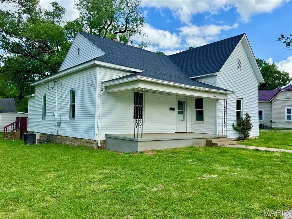 BRAND NEW ROOF! What a great house sitting on a corner lot. Lot's of old charm in this home. Original wood floors, 10' ceilings, built ins, and beautiful moldings. The living room/dining room combo is large with lots of windows letting in lots of natural light.  There is a bow window with alcove in the dining room giving it a homey feel. The kitchen has a ton of cabinets and storage. There are three good size bedrooms and a den or maybe a nursery. There is lots of storage in the home with the extra closets. Home has already passed the occupancy inspection.