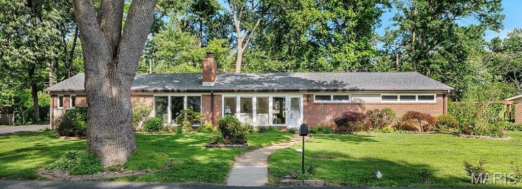 Exceptional Opportunity in Ladue Schools! This spacious 3+ BR, 2.5 Bath home offers over 2,100 sq. ft. of main-level living space, combining move-in-ready comfort with fantastic potential. New HVAC (2026) and a roof only 3 years old offers peace of mind, but the real showstopper is the unique  21' x 22' bonus room—an incredible flex space that can easily become your dream home office, a fun playroom, a home gym, or a private guest suite. Outside, the large backyard offers a private oasis with room to relax, entertain, garden, or play, while the patio serves as the perfect setting for morning coffee or casual dining. A large driveway and detached two-car garage gives you plenty of parking and extra storage space. The lower level adds even more room to spread out, complete with a handy half-bath, recereation room, laundry area & storage—just waiting for your personal style and finishing touches. GREAT price, location and all nestled in a peaceful neighborhood with access to all the Ladue community has to offer!