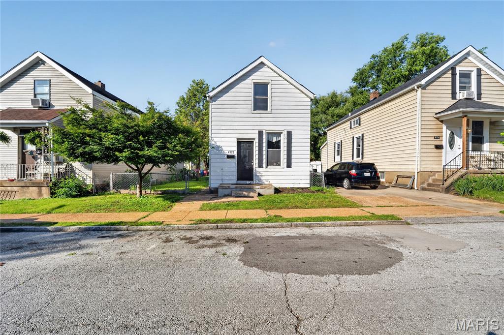 Charming and historic 2-story residence located in the heart of the sought-after Bevo Mill neighborhood of St. Louis. Built in the early 1900s, this home blends classic architectural character with everyday functionality. The inviting exterior features traditional brick construction and a welcoming covered entry.

Inside, the home offers a practical and comfortable layout with generous living spaces, high ceilings, and abundant natural light. The main level includes a spacious living room, a formal dining area ideal for entertaining, and a functional kitchen with ample cabinetry and workspace. A convenient main-level laundry area adds everyday ease.

Upstairs, well-proportioned bedrooms provide flexible living options for families, guests, or home office use. The full bathroom is centrally located for accessibility from all bedrooms.

Additional highlights include a full basement offering storage potential, updated mechanical systems, and a fenced backyard with space for outdoor enjoyment or gardening. Street parking is readily available, and the property sits on a paved residential street within a mature, established neighborhood.

Conveniently located near schools, parks, shopping, and major commuter routes, this home offers both accessibility and neighborhood charm. A great opportunity for buyers seeking character, space, and value in South St. Louis.