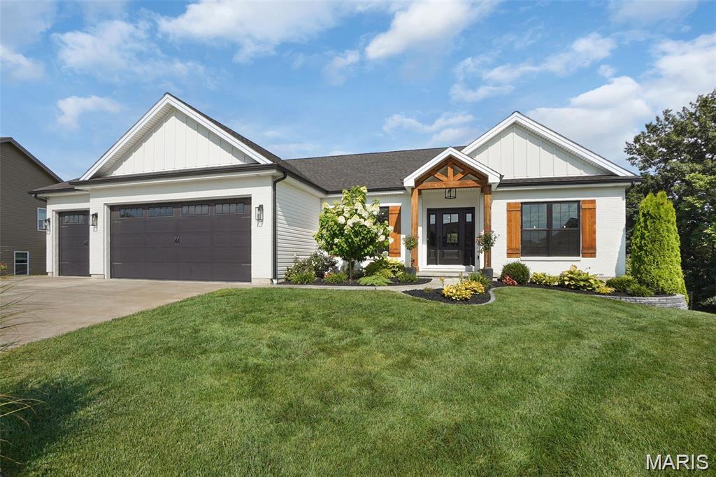 Luxury living on a large homesite that backs to trees.  This plan features 3 main floor bedrooms, a spacious kitchen / dining / great room for gathering the family, and an office perfect for working from home. The kitchen includes an oversized island with quartz tops, upgraded cabinets, and upgraded appliance package w/ range hood and microwave built into the island.  The kitchen is open to the great room, where you'll find a fireplace and plenty of windows for natural light. Don't miss the three car garage, covered back deck, 4 and an oversized walk out patio.  The master suite includes a walk in tile shower.  Premium brick and stone elevation.This beautifully crafted new home sits on a private homesite backing to mature trees, offering peaceful views and everyday privacy rarely found in new developments.

Inside, you’ll find a thoughtfully designed open floor plan with soaring ceilings, oversized windows, and high-end finishes throughout. The kitchen is built for both beauty and function, featuring custom cabinetry, quartz countertops, a large center island, and premium fixtures — perfect for entertaining or quiet mornings at home. The primary suite is a true retreat with a spa-inspired bath, walk-in closet, and serene backyard views. Additional bedrooms offer flexibility for guests, office space, or hobbies.

Step outside to a covered patio overlooking the tree line — ideal for grilling, relaxing, or simply enjoying the natural setting. Every detail of this home reflects quality craftsmanship, energy-efficient construction, and modern design trends buyers are searching for.

Stone Bridge is known for its scenic setting, walking trails, nearby parks, and easy access to shopping, dining, and downtown Washington — a community that continues to attract buyers from across Franklin County and the St. Louis region.

Built by Northern Star Homes — Washington’s hometown builder — known for exceptional craftsmanship, transparent communication, and treating every client like family. When you build with Northern Star Homes, you get local expertise, trusted quality, and a home built the right way from the start.

Enjoy your private backyard in an ideal WashMO location - Stone Bridge, by Northern Star Homes