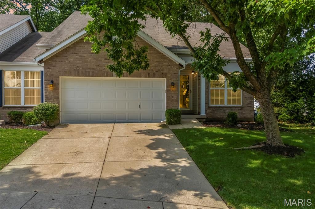 Stunning villa located in the sought after Estates at Parkview subdivision in Ellisville! This home boasts 3 bedrooms, 2.5 bathrooms, and over 2,000 square feet of living including the finished lower level. Convenient end-unit allows for extra windows and natural light!

The front door opens to the family room with a vaulted ceiling, gas fireplace, and gleaming hardwood floors that flow throughout most of the main level. The kitchen boasts a newer refrigerator and a dining area with a new sliding glass door (2025) that opens to the back deck. 

The main floor primary bedroom features a walk-in closet and the primary bathroom with a dual vanity, shower with a bench, and a linen closet. The powder room and laundry room with a cabinet for additional storage complete the main level. 

The second level boasts two additional bedrooms, a full hall bathroom, and a loft area with hardwood floors. Each bedroom has a walk-in closet. 

The lower level features an office and ample storage space with a utility sink and plumbing rough in. Other highlights include: 2 car garage that is fully dry walled and has epoxy floors. 

Relax outside on the wood back deck or at the fire pit area and enjoy the private backyard backing to woods. Location could not be better – close to major highways, restaurants, shops, schools, and walking distance to Bluebird Park!