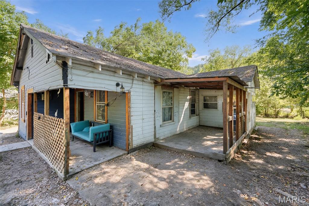 This 3-bedroom, 1 bath home feels like you are in the country with all the amenities of being in town. Trees line both sides of the property, offering plenty of shade and privacy. A cozy, covered front porch is just the place for morning coffee. Add the finishing touches to make this home "yours".