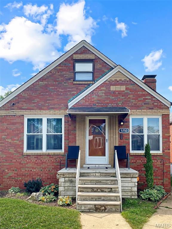 This charming South City home packs quite a punch. It's a 4 bedroom, 2.5 bath home w/ original wood floors, arched doorways, & period tilework. Two bedrooms on the main floor (the primary has his/her closets) & two bedrooms upstairs (perfect for the kids or as a home-office). The large family room in the basement is a perfect place for movie night, a play area for the kids, a workout area, or a large office. The covered backyard patio is a great spot to sit around a fire and enjoy the big game or watch a family movie. Plenty of room to park and store garden tools in the  2 car oversized garage. Updates include newer dishwasher, microwave, hot water heater & furnace humidifier, French drain, covered concrete patio, mini-splits, ceiling fans, basement carpet squares, some windows, & some light fixtures. Located just 1 block from Tilles Park (playground, pickleball, walking trails, etc.), this adorable bungalow has so much to offer.