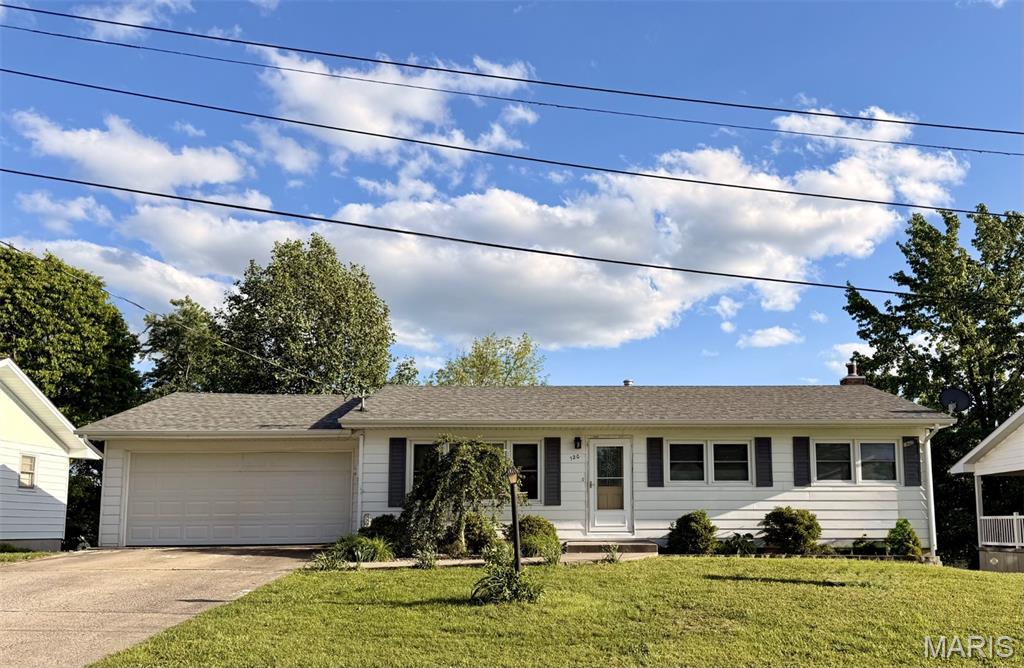 Discover the inviting ranch-style residence located in the heart of the city at 120 Macarthur ST, NEW HAVEN MO 63068, a ready-to-move-in single-family home constructed in 1965 features an updated kitchen and main floor bath, hardwood flooring, bonus sunroom that overlooks a parklike backyard that is level and fenced. This property offers a harmonious blend of classic charm and modern comfort, designed for effortless living. This home provides three comfortable bedrooms, offering ample personal space. Complementing these are two well-appointed bathrooms, ensuring convenience for residents and guests alike. An attached garage offers practical storage solutions and direct access, enhancing the home's functionality. The lower level has a partial finished room that would be perfect for an office or den, walk out to the covered patio perfect for entertaining. This residence presents an exceptional opportunity to embrace a comfortable and convenient lifestyle.