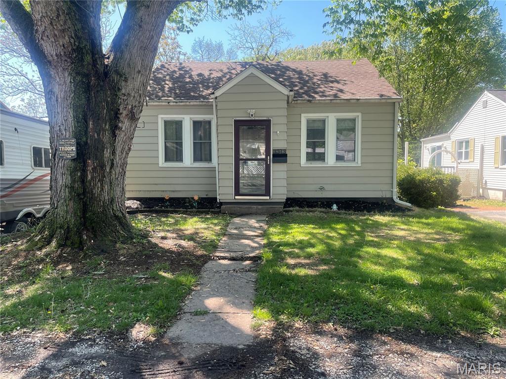 Great opportunity for investors or landlords! This affordable property offers strong rental potential in a convenient Alton location. Features include a functional layout and a low maintenance exterior - perfect for adding to your portfolio or starting your investment journey. With demand for rentals remaining steady, this property presents an excellent chance to generate consistent cash flow. Welcome to this charming 4 bedroom, 2 bath house offering comfortable living in a smart, efficient layout.  Original wood floors, updated bathroom, fenced backyard, walk out basement and a detached garage add loads of options for storage. Whether you are a first time buyer or an investor this home offers great potential and flexibility. Conveniently located near schools, shopping and local amenities. Check out this home today!