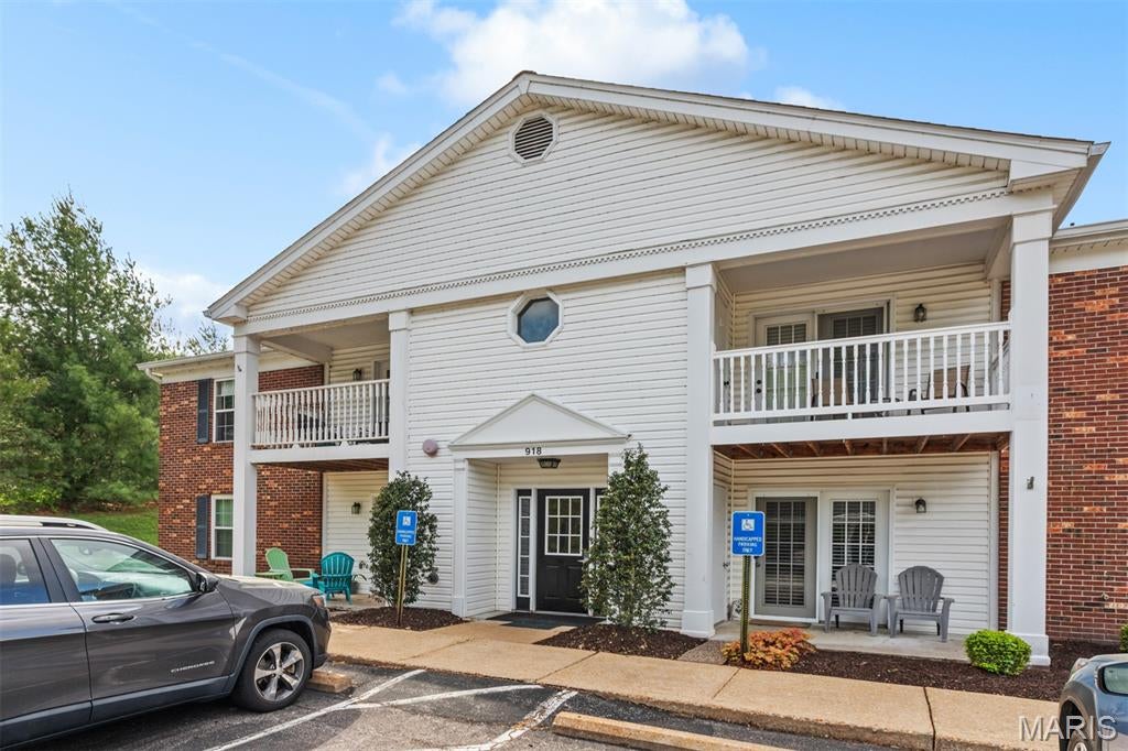 Welcome to 918 Hanna Place Court, Unit F—where modern updates meet easy, low-maintenance living! This beautifully renovated ground-floor condo offers 2 bedrooms, 2 full bathrooms, convenient no-step access, and along with private key pad entry to the units in the building for a sense of safety. Nearly every detail has been thoughtfully updated, creating a fresh, move-in-ready space from the moment you walk through the door. The stylish kitchen features modern cabinetry, custom quartz countertops and backsplash, LED accent lighting, and new GE stainless steel appliances, including an oven and microwave with built-in air fryer features. Luxury vinyl tile flooring flows throughout the home, complemented by updated lighting, custom window blinds, and a bright, contemporary feel. Both bathrooms have been beautifully refreshed with floating vanities, quartz countertops, updated fixtures, and modern finishes.. Enjoy your own patio, assigned covered carport space, additional surface parking, and a location convenient to Big Bend Road, Highway 141, Manchester Road, shopping, dining, parks, and the Parkway School District. If you've been searching for a **completely updated, move-in-ready condo with first-floor living**, this one deserves a look. Just unpack and enjoy!