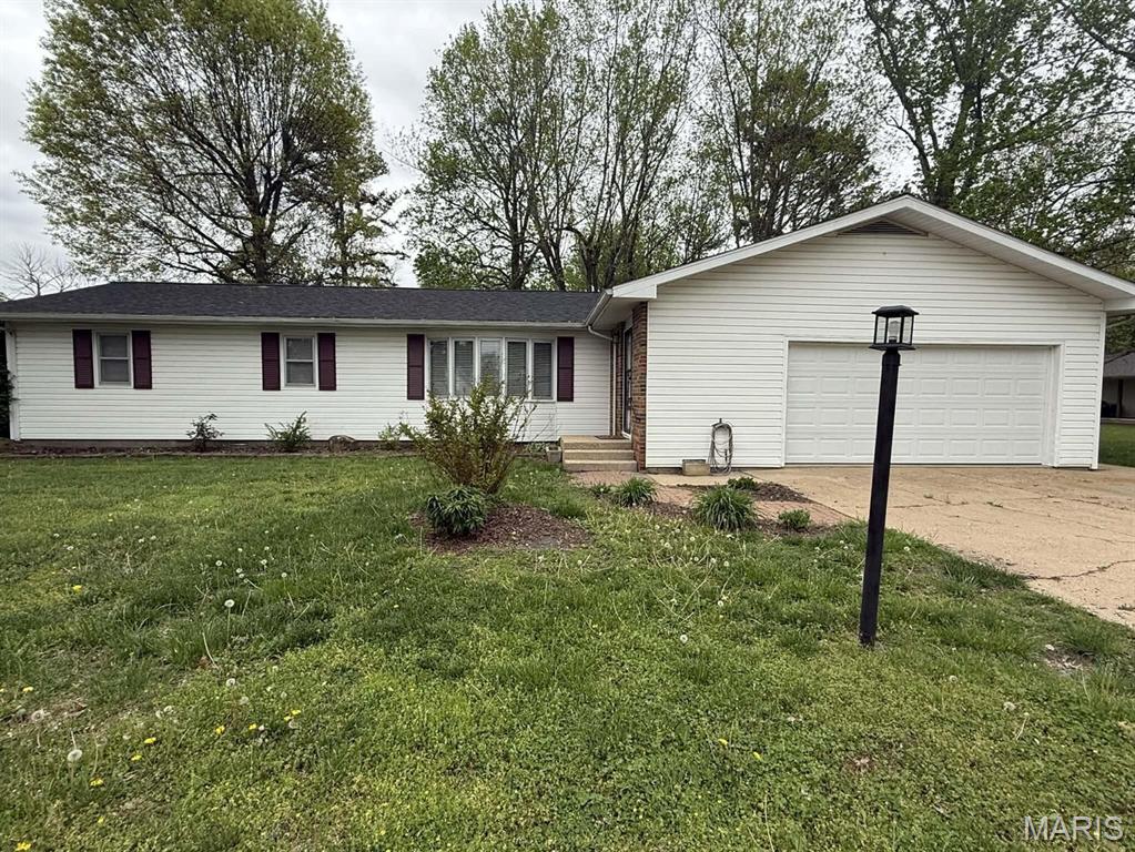 This charming 3-bedroom, 1.5-bath home offers the perfect blend of comfort, space, and tranquility in a peaceful, well-kept neighborhood. Inside, you'll find two inviting living areas--ideal for entertaining or simply spreading out and relaxing. Both spaces feature stunning bay windows that flood the rooms with natural light, creating a bright and airy feel while enhancing the sense of space. The generously sized kitchen and dining area provide plenty of room for meals, gatherings, and everyday living. Just off the dining space, step onto a lovely deck--perfect for morning coffee, weekend barbecues, or enjoying time with family and friends. The home also features a large full bathroom and thoughtfully designed living spaces throughout. Outside, the spacious yard is beautifully landscaped and includes a raised garden bed area for those with a green thumb, as well as a handy outbuilding for extra storage or hobbies. Whether you're looking for a wonderful place to raise a family or a quiet retreat to enjoy your retirement years, this home offers comfort, charm, and a welcoming atmosphere you'll love coming home to.