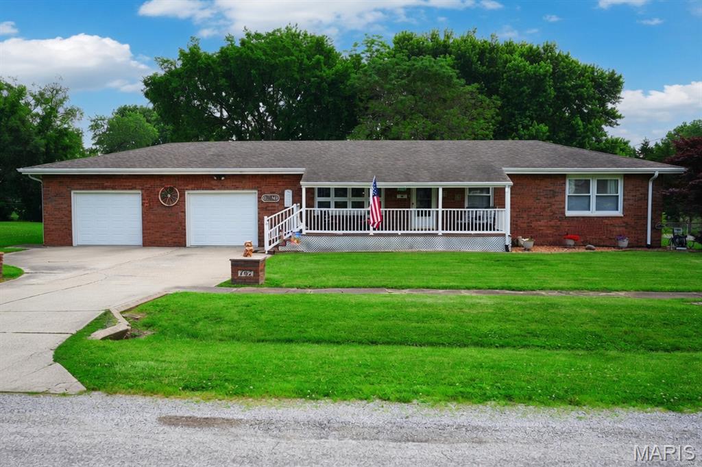 Charming 3-Bedroom,1.5 Bath Brick Ranch on a Large Corner Lot  fenced in– Move-In Ready!
Welcome home to this beautifully maintained brick ranch, perfectly situated on a spacious lot that offers privacy and room to grow. The inviting covered front porch welcomes you into a bright and functional layout ideal for comfortable living and entertaining.
Step inside to the spacious living room featuring built-in shelving and a large picture window that frames peaceful views of the front porch and yard. Adjacent is a separate dining area, perfect for a large table and chairs, seamlessly connected to the galley-style kitchen. The kitchen offers abundant cabinet and counter space, all appliances included, and an efficient layout that makes meal prep a breeze.
A highlight of this home is the beautiful 4-season enclosed sunroom overlooking the private backyard—an ideal spot for morning coffee, relaxing with a book, or enjoying the outdoors year-round without leaving the comfort of home. The main level also includes three generously sized bedrooms, with one conveniently doubling as a main-floor laundry room for everyday ease. Main floor bathroom recently converted to bath fitter with lifetime warranty. 
Downstairs, you’ll find a large recreation room with endless possibilities—convert it into a family room, home gym, office, guest suite, or media room. A 1/2 bathroom completes the lower level, adding flexibility and convenience. Roughed into make full bath.  Basement is poured concrete. 
Outside, enjoy the expansive backyard complete with a newer large deck, perfect for BBQs, gatherings, or simply unwinding in privacy. A substantial shed provides excellent workshop or extra storage space, while the 2-car attached garage offers ample room for vehicles, tools, and storage. Extra large second spot offers more work shop space.
Furnace is 3 years old.  Whole house sediment filter.  Sump pump in basement with life time warranty and waterproofing. 
This move-in-ready home combines classic brick charm with practical, modern living. Don’t miss your opportunity to make it yours—schedule a showing today!