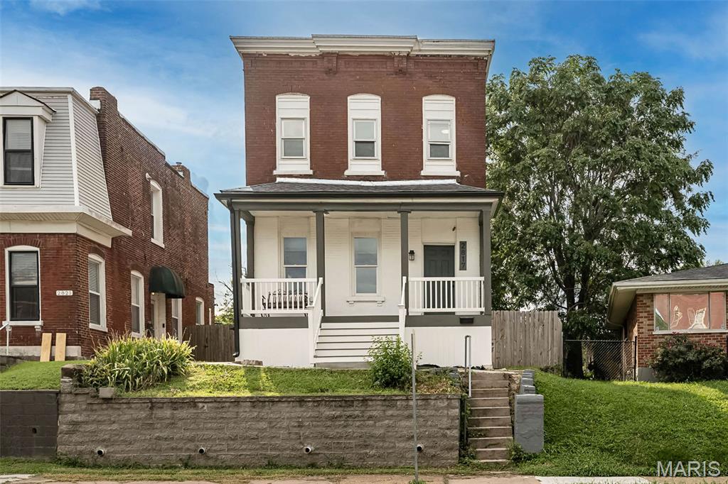Welcome to your charming Tower Grove East city home, where historic character meets thoughtful modern updates! Step inside and immediately notice the soaring ceilings, abundant natural light, and beautiful antique wood floors that give this brick beauty plenty of personality.

The remodeled kitchen is ready to impress with new shaker cabinets offering tons of storage, quartz countertops, custom tile, and stainless steel appliances. Major updates take the guesswork out of homeownership, including new windows, updated HVAC, plumbing and electrical, plus a new water heater.

The improvements continue outside with a TPO roof and seamless gutters replaced in 2024. The front porch was completely rebuilt in 2025 with durable composite decking, creating the perfect spot for morning coffee or evening people watching. HVAC updates include a new AC evaporator coil and condenser in 2025.

Upstairs, the spacious bedrooms feature tall ceilings and generous closets, while the full basement provides plenty of room for storage, hobbies, or future possibilities. Off street parking adds another city-living bonus.

And then there is the location! Enjoy the best of Tower Grove East with neighborhood favorites, parks, restaurants, coffee shops, and entertainment all nearby. This home brings together old-school St. Louis charm, modern updates, and a location that makes city living seriously fun. Come take a look and see why this one deserves a spot on your must-see list!