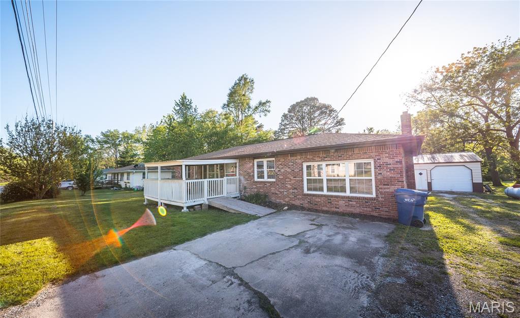 Charming move in ready home with spacious shop! This well maintained home has so much to offer. Three bedrooms, one bathroom and two separate living areas with hardwood floors throughout! Updated kitchen with plenty of cabinet space. Outside you'll find a large covered front porch, new back deck, and yard perfect for entertaining. One of the standout features of this property is the 36x24 detached shop with plenty of room for equipment, tools, or vehicles. Call to schedule your showing today!