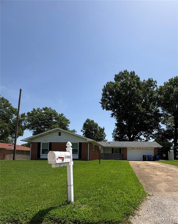 Welcome home to this spacious and well-maintained 3-bedroom, 2.5-bath brick ranch offering over 1,500 square feet of comfortable main-level living in an established North St. Louis County neighborhood. Step inside to discover fresh neutral finishes, updated luxury vinyl plank flooring, generous living spaces, and an open kitchen featuring abundant cabinetry, ample counter space, and a breakfast bar perfect for everyday living and entertaining.

The primary suite includes a private full bath, while two additional bedrooms provide flexibility for family, guests, or a home office. The finished lower level expands your living space and includes a convenient half bath, with the potential for a future shower installation, subject to buyer verification and any necessary plumbing or permitting requirements. This versatile space is ideal for a recreation room, media room, workout area, or guest accommodations.

Outside, you'll appreciate the oversized yard, attached two-car garage, and classic brick exterior offering timeless curb appeal. Recent HVAC maintenance provide added peace of mind for the next owner.

Conveniently located near shopping, dining, parks, major highways, and Christian Northeast Hospital, this move-in-ready home offers exceptional value for homeowners and investors alike.

Don't miss this opportunity to own a beautifully maintained ranch with space, versatility, and an outstanding location. Schedule your private showing today!