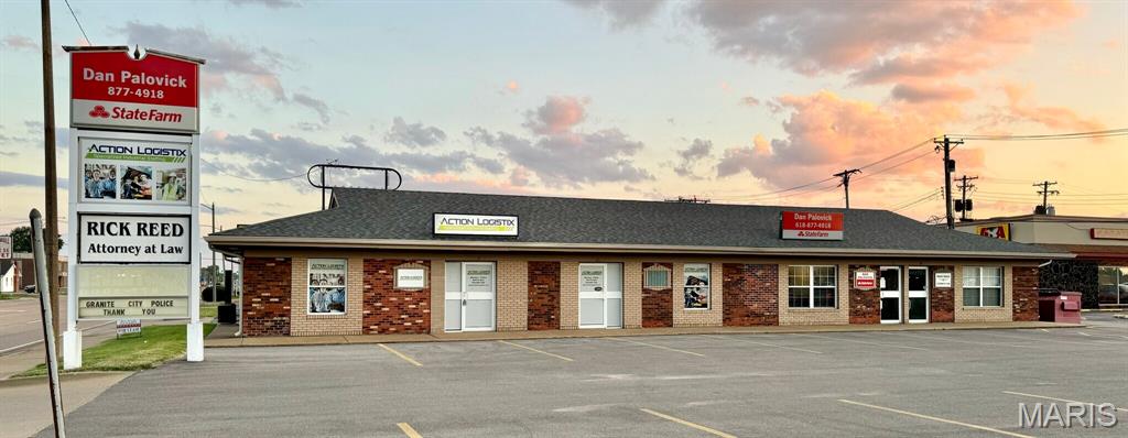 Prime investment or owner-user opportunity located on high-traffic Nameoki Road in Granite City. This well-maintained 3,372 SF multi-tenant office building features two established tenants—State Farm Insurance and a law firm—and one fully built-out 1,700 SF suite available for lease or owner occupancy. Building was renovated in 2022, and the property includes 22 surface parking spaces and prominent signage. Ideal for office, medical, or professional service use in a visible and accessible retail corridor.