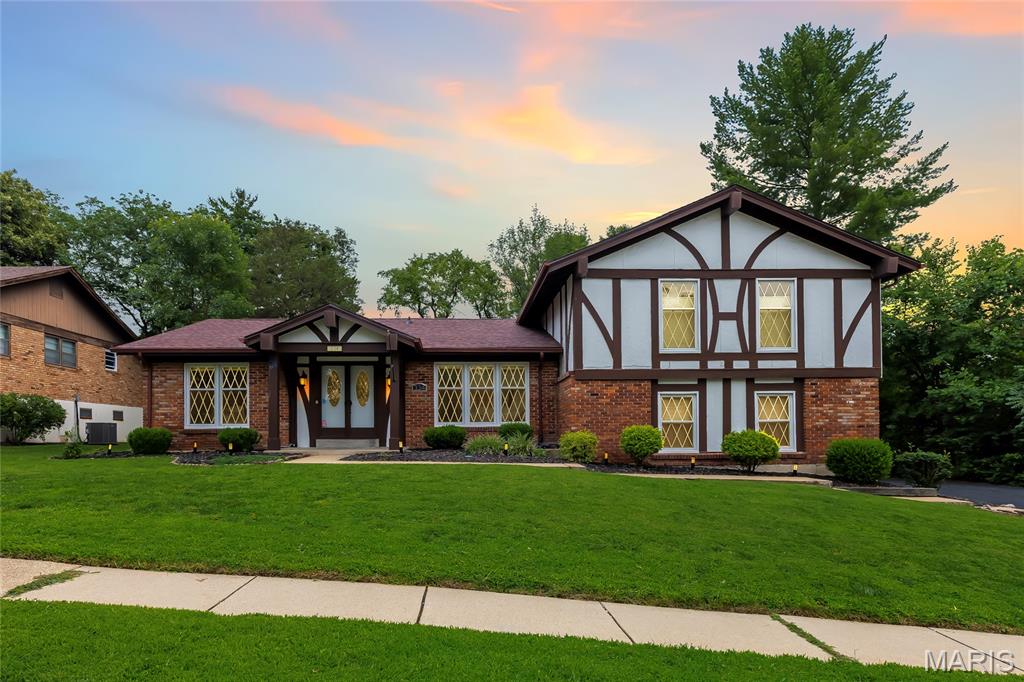 Welcome to this beautifully refined residence in sought-after Chesterfield, where timeless elegance meets elevated everyday living. This home offers a fresh, luxurious feel from the moment you step inside.

The main level showcases sophisticated formal living and dining rooms with rich hardwood flooring, complemented by a spacious family room designed for both comfort and style. The kitchen is a standout, appointed with hardwood cabinetry, granite countertops, stainless steel appliances, a sleek glass cooktop with hood, and double wall ovens—perfect for both intimate dinners and elevated entertaining. Step outside to a level, partially fenced backyard, offering a serene setting for outdoor gatherings or quiet evenings.

Upstairs, retreat to the expansive primary suite, complete with dual walk-in closets and a spa-inspired en suite bath featuring dual vanities separated by a glass-enclosed shower. Two additional bedrooms share a well-appointed full bath, providing both comfort and convenience. New carpet has been installed throughout this level of the home.

Just a few steps down from the main level, discover a versatile fourth bedroom or private office, along with a generously sized laundry room with utility sink. The finished lower level is an entertainer’s dream, boasting multiple expansive living areas, a second powder room, kitchenette, and a private sleeping space—ideal for hosting guests or creating a luxurious retreat.

All of this, located within the highly acclaimed Parkway School District, makes this home an exceptional blend of style, space, and sophistication.