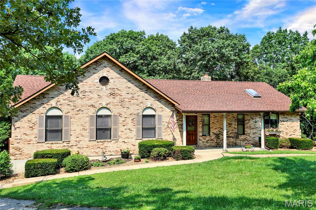Welcome to this exceptional 2,072 sq ft retreat set on 19+/- acres of wooded privacy, a true outdoor enthusiast's dream. Inside, enjoy 3 large bedrooms, 2.5 baths, and a flexible office easily converted into a 4th bedroom. The large kitchen is filled with natural light, offering a bright, welcoming space to cook and gather.  Two fireplaces add warmth throughout, wood-burning upstairs, propane in the finished walkout basement, which leads to a private patio and pool. Upstairs, an expansive deck overlooks the surrounding woods. 

Outdoor living continues with private trails ideal for hunting and UTV riding, plus a lakeside fishing cabin with stocked lake and its own bathroom, perfect for entertaining or as a potential income-producing STR

The 60x40 garage is a standout, featuring extra-tall doors for large trucks, equipment, or RV storage, along with its own bathroom, office area, wood-burning stove, 30' radiant propane heater, air compressor, and walk-in cooler. 

For added peace of mind, this home features a 5-year-old AC unit, a 2-year-old pool pump, and a roof replaced in 2023, plus exceptional energy independence, thanks to a diesel generator capable of powering the entire home and solar panels supporting both the home and garage.

This property offers far more than words can capture — schedule your showing today! Because of the care and improvements to the home, it is being sold AS IS.