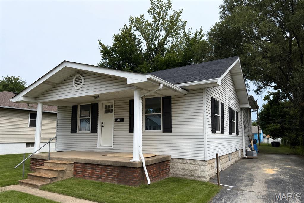 Newly remodeled home in Roxana School District, make an appointment today! Main level includes 1 bedroom and 1 full bath, living room and kitchen. The second level includes 3 bedrooms and another full bathroom. The basement has a large family/game room and a separate storage section/laundry room. New windows, roof, flooring, electrical, plumbing, kitchen cabinets, appliances, etc. This one won't last long.