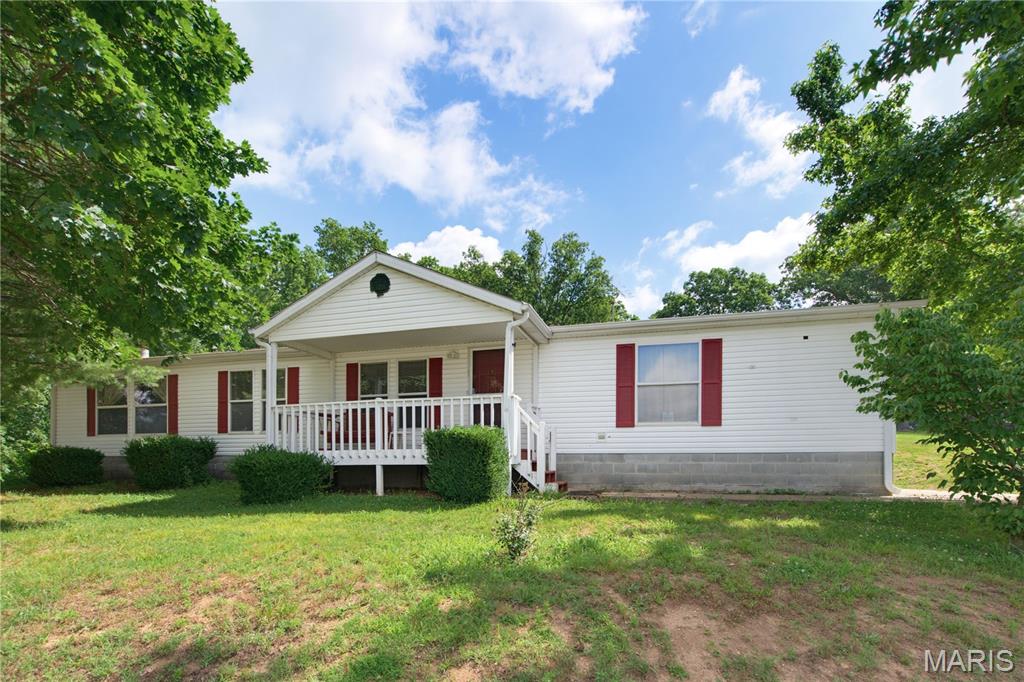 Check out This Dream Property! This Gem has everything you have been looking for and more. This incredible 3-bedroom, 2-bath home has an awesome living room, and a cozy family room with a sleek gas fireplace, complete with an open-concept design, an island breakfast bar. The Primary bedroom has a Super Sharp soaking tub, and a separate walk in shower, complete with a double vanity, all with a door that leads out to the back deck for convenience. When you Step outside you will enjoy gorgeous views in every direction, along with front, and back porches and decks, with a convenient carport out back. 
But that’s just the beginning, Seeing this is just 7.8 miles from the Beautiful Black River, and K Bridge, at the back of the property, you’ll find your own RV paradise featuring 5 full RV hookups with electricity, water, and sewer. perfect for guests, family or income potential.
And then there’s the highlight of them all, a fully equipped, fully furnished barn/barndo, formerly the beloved Black River Winehouse. This is where the magic happens! Whether you want to reopen it as a winehouse, create an unforgettable event venue, host amazing family gatherings, or build a one-of-a-kind creative space, the possibilities are endless.  Complete with restrooms and showers, for those camping. Also, the outdoor dining area, fire pit, and stage are ready for unforgettable nights under the stars. All of this is just minutes from K Bridge/Black River, and a short drive to Elephant Rocks, Johnson Shut-Ins, Sam A. Baker State Park, Clearwater Lake & Marina, and Bluff View Marina. Fully furnished, with equipment, and appliances, and furniture in The Home and Winehouse. You won't want to miss this incredible Opportunity.
