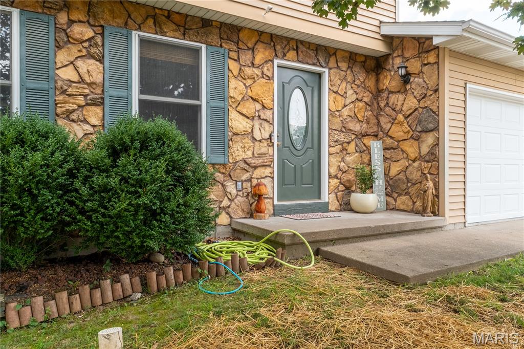 Welcome to this charming two-story home in St. Jude subdivision. This home offers a functional layout with all 3 bedrooms and full bath upstairs. On the main level you will find a family room, kitchen, dining room, laundry, a half bath, and access to an attached 2 car garage with additional room for storage. Basement has a half bath, storage room, and a built-in bar. Let's not forget the large backyard that is perfect for entertaining! 

Professional interior and exterior photos 7/8, will be uploaded when available.