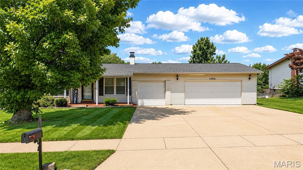 Welcome home to this beautifully updated 3-bedroom, 2-bath ranch offering the perfect blend of comfort, style, and functionality! The bright and inviting main level features spacious living areas with hardwood floors, an updated kitchen with modern cabinetry, stainless steel appliances, and easy access to the deck overlooking the backyard.

The finished lower level expands your living space with a large family/rec room, an additional sleeping area, a full bath, and plenty of storage—ideal for guests, a home office, or multi-generational living. Outside, you'll appreciate the oversized driveway, attached garage, mature shade trees, and spacious yard perfect for relaxing or entertaining.

Conveniently located near parks, schools, shopping, and major highways, this move-in-ready home offers the space you've been looking for at an incredible value. Don't miss your opportunity to make  this your next home!