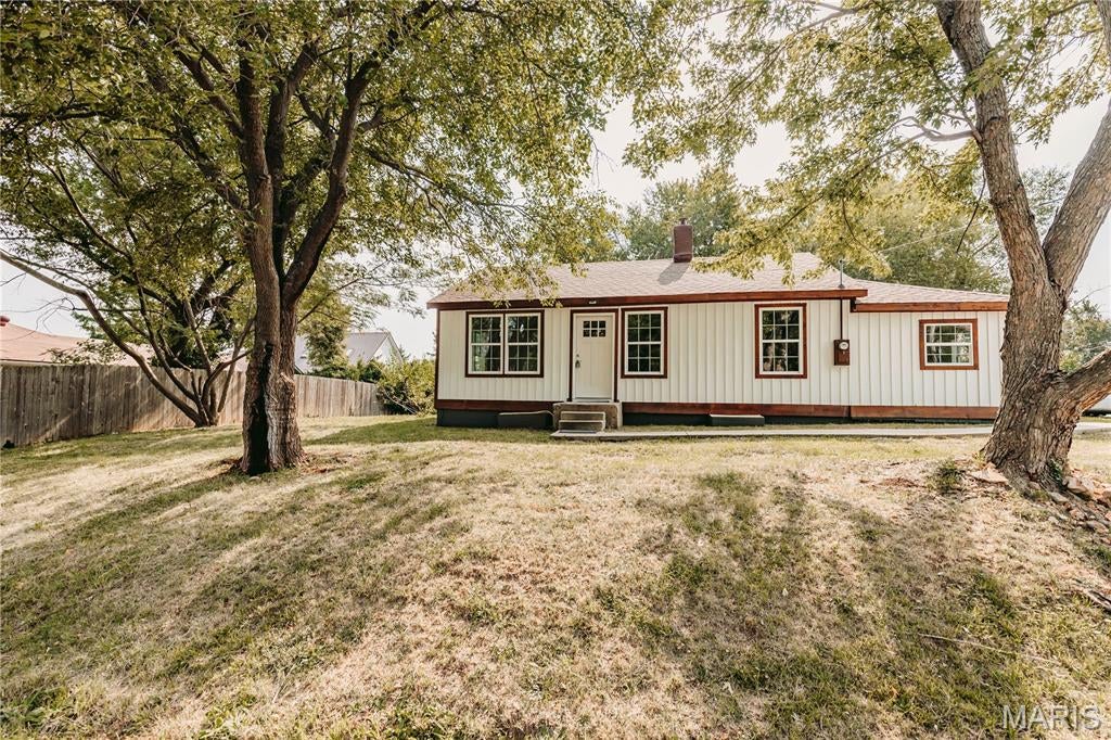 Recently updated and ready for its next owner! This 2-bedroom, 1.5-bath home features a newly added main-level laundry/mudroom, plus a basement offering plenty of additional storage space. The seller is also offering an appliance allowance with an acceptable offer. Situated on a city lot, the home is conveniently located near the city park, local restaurants, shopping, a gym, and other area amenities. Off-street parking provides added convenience. Step through the front door into the main living area, where updated finishes and thoughtfully selected colors and accents create a warm and inviting atmosphere. A stylish half bath is conveniently located between the living room and kitchen. The former third bedroom has been converted into a spacious laundry/mudroom, providing added functionality and convenient main-level laundry. The two bedrooms are positioned on either side of the full bathroom, creating a practical layout. With recent updates, main-level laundry, functional living spaces, basement storage, and a convenient location, this home is ready to see. Schedule your showing today!