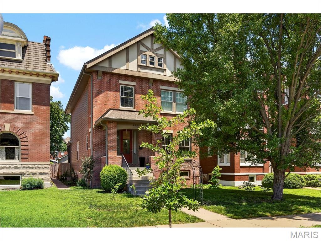 Situated on a quiet Central West End cul-de-sac, this impeccably designed, 12-year-old home offers the ideal blend of sophisticated style and daily functionality. The steps of the covered front porch are the perfect spot to sip morning coffee while soaking in views of the stunning Cathedral Basilica of St. Louis. Once inside, you are greeted by soaring 10-foot ceilings, beautiful wooden floors and rooms awash in abundant natural light.

The sleek, white kitchen boasts a large island with seating and tremendous storage opportunities. From the adjacent coffee bar, flow seamlessly past a linear gas fireplace to nestle in the cozy family room. A formal dining room, dedicated office, and main-floor laundry complete the main level.

Upstairs, the luxurious primary suite features its own linear fireplace, a spa-like bath with heated floors, and a massive walk-in closet. Three additional bedrooms share a nearby pristine full bath.

Enjoy outdoor living at its best on the expansive covered patio, complete with 20" privacy screens, play space and a fire pit. Downstairs, the deep-pour unfinished basement offers unlimited potential to finish and includes a secure shelter built below the stairs for ultimate safety. Modern mechanical upgrades include a sophisticated dual-battery backup system on the sump pump/furnace and a sophisticated SimpliSafe system which includes security cameras, glass break sensors, motion sensors as well as monitored water sensors, carbon monoxide & smoke detectors.

The property is complete with a fully fenced backyard, young plantings of fruit trees and shade trees, a garden irrigation system, and a detached two-car garage outfitted with its own electric panel and counter-height outlets. A rich world unto its own, you will enjoy all this, just a short stroll to the vibrant eateries and shops of the CWE!