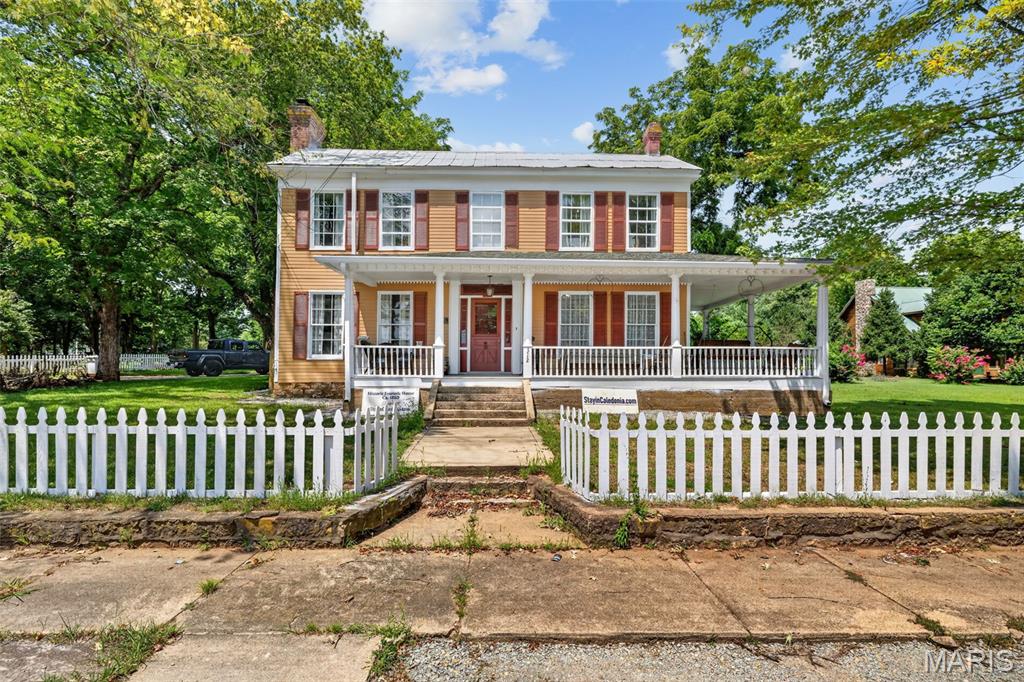 Step into a piece of history with this charming historic home, known as the George H. Eversole House built in 1856. Full of character and timeless appeal, this 3-bedroom, 3-bath residence offers the opportunity to own a truly unique property with plenty of room to make it your own. From its historic charm and distinctive details to its spacious layout, this home blends the character of a bygone era with modern updates. The three large bedrooms provide flexibility for family, guests, a home office, or hobby space, while three full bathrooms add convenience. Whether you're drawn to historic homes, looking for a spacious residence, or searching for a property with unlimited potential, this one is worth a closer look. Don't miss your chance to own a piece of local history and bring your vision to life!