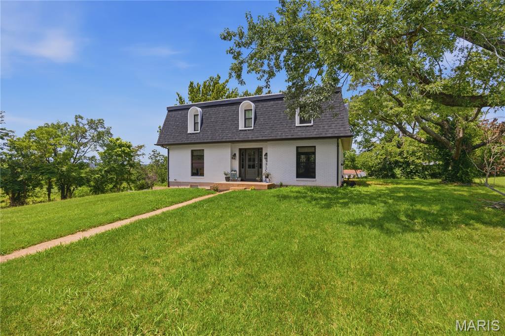 Welcome home to this beautifully remodeled 4-bedroom, 2.5-bath home that combines modern updates with custom craftsmanship throughout. The stunning custom kitchen features all-electric stainless steel appliances, a built-in oven, and quality finishes designed for both everyday living and entertaining.
Enjoy meals in the separate dining room, and appreciate the custom woodwork and luxury flooring that add warmth and character throughout the home.
Additional features include a 2-car tuck-under garage, a partially finished basement offering extra living or recreation space, and a spacious screened-in back porch that's perfect for relaxing year-round.
Situated on a desirable corner lot, this property boasts a concrete circle drive, a large yard with plenty of room for outdoor activities, entertaining, gardening, or simply enjoying the outdoors. This move-in-ready home offers the perfect blend of style, comfort, and functionality. Do not miss out on this one!!