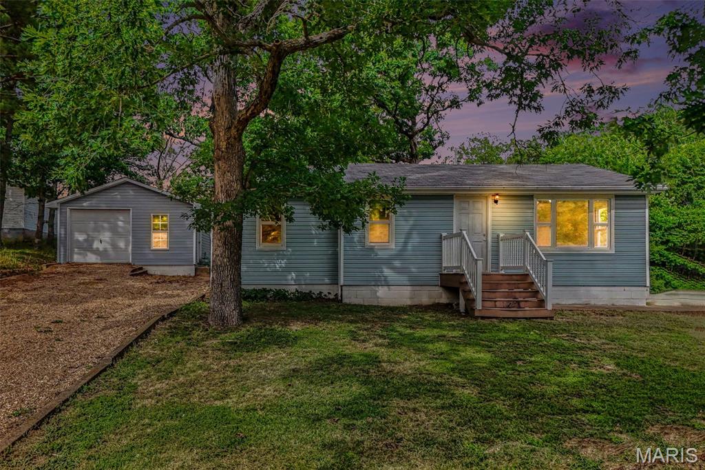 Welcome to this delightful 3-bedroom, 1 bathroom home located on a quiet street in Sullivan, just minutes from shopping and restaurants. The home features 3 spacious bedrooms, vinyl plank flooring throughout, an updated kitchen, and a remodeled bathroom. Plus, an oversized one-car garage provides plenty of room for parking, storage, or even a workshop. Don't miss the opportunity to own this lovely home before the end of summer!