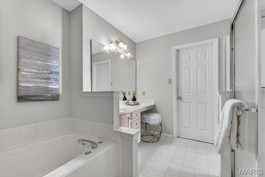 Welcome to 16475 Cove Landing Ct.  There's so much to love about this home’s cul-de-sac location in the sought-after Lake Chesterfield community. Residents of this popular neighborhood enjoy community clubhouse, multiple pools, tennis & pickle ball courts, sports court, walking trails and private lakes. Upon entering the home you will immediately notice the vaulted ceilings, open floor plan and so much natural light. This one owner ranch style home has been meticulously cared for and updated, and pride of ownership is evident. Front entry, living and dining rooms are the first areas that greet you. The expansive, updated kitchen opens to the notably large family room, which the owners had the builder expand when the home was built. This makes for such great living space and leads to the backyard and patio. The split bedroom floor plan provides a private primary bedroom suite with spacious bath and walk-in closet. Two additional bedrooms and full bath complete the main level. The finished lower level provides even more living space, with a substantial rec room, office, full bath, awesome walk-in closet, workshop area and so much storage. Fantastic location in the Rockwood School district, close to so many amenities!