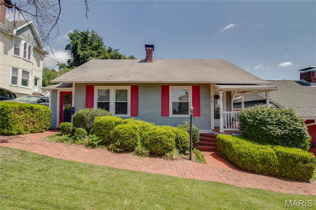 Nestled in Alton's sought-after Historic Christian Hill neighborhood, this charming 1-2 bedroom, 1 bathroom home offers character, comfort, and an unbeatable location just blocks from both Downtown Alton and Riverview Park. Step inside to find a freshly painted interior featuring a spacious open-concept living and dining area, perfect for everyday living or entertaining. A bright sunroom with skylights provides the ideal space to relax and opens onto an expansive deck overlooking the backyard. The full unfinished walk-out basement boasts impressive 12-foot ceilings, providing incredible storage now and endless possibilities for future finished living space, a workshop, home gym, or recreation area. Enjoy added peace of mind with a whole-home generator and numerous updates throughout the years, including a furnace (2012), air conditioner (2015), windows (2013 & 2014), front porch railings (2018), exterior paint (2018), breezeway cabinetry (2019), living room window treatments (2019), front screen door (2020), LeafGuard gutter system (2022), kitchen flooring (2023), and washing machine (2025). Whether you're looking for your first home, downsizing, or searching for a home full of charm in a prime location, this one is ready to welcome you home. Agent related to seller.