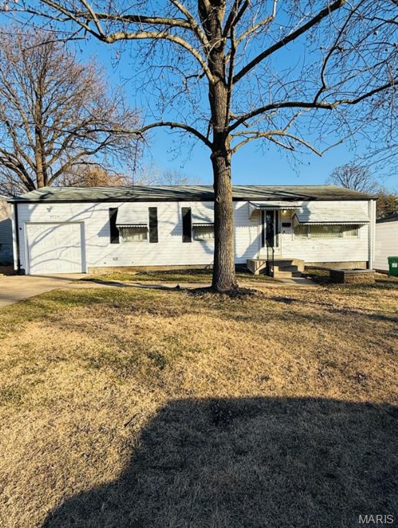 Walk into this well kept 3 bedroom, 1 bathroom home located on a quiet street in Bellefontaine Neighbors. Gleaming hardwood floors throughout and luxury vinyl plank in the kitchen. Spacious living areas and bedrooms. The living space extends outside on the sunporch and spacious rear yard. Extra living area in the basement with a partially finished play room, recreation room, office or family room. Washer and dryer hookups in the basement for your convenience and a 1 car garage! Check this one out now before it's gone! Sewer utility included in the rent, tenant pays all other utilities. NO SMOKING/VAPING IN THE HOME NO PETS PLEASE!