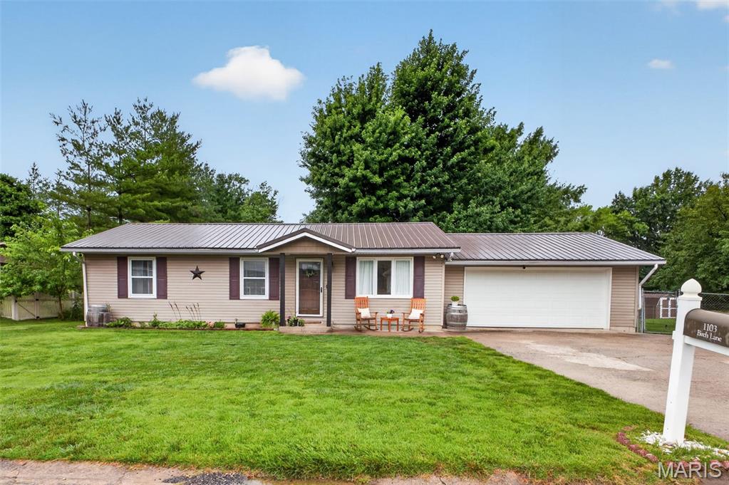 Welcome to 1103 Birch Lane in Sparta, Illinois! Situated in a desirable neighborhood, this well-maintained 3-bedroom, 2-bathroom home offers the perfect combination of comfort, functionality, and space to entertain. Step inside to find an inviting main level featuring an updated kitchen with appliances that will remain, a spacious living room anchored by a cozy electric fireplace, and three comfortable bedrooms served by a full bathroom. Step through the sliding glass door onto the back deck, creating the perfect space to enjoy your morning coffee, host summer cookouts, or simply relax while overlooking the fully fenced backyard.
The finished lower level provides exceptional additional living space, complete with a large family room, a full bathroom, a bar area perfect for hosting family and friends, and ample storage space. Recent and notable features include a durable metal roof and a sump pump for added peace of mind.
Whether you're looking for room to grow, space to entertain, or simply a move-in ready home in a great location, 1103 Birch Lane offers a wonderful opportunity to enjoy comfortable living with features today's buyers will appreciate.
