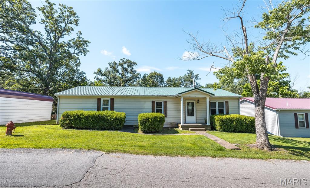 Welcome home to this charming ranch-style property nestled in the heart of Dixon! Offering over 1,800 square feet of comfortable living space, this 3-bedroom, 2-bathroom home combines functionality, character, and plenty of room to spread out. Whether you’re a first-time buyer, growing household, or looking for a home with extra space and convenience, this one checks all the boxes! Step inside and you’ll find a warm and inviting layout featuring a spacious living room perfect for relaxing or entertaining guests. The beautiful kitchen is a standout with custom cabinetry, stainless steel appliances, and plenty of storage and workspace—a great space to cook, gather, and make memories. Need more room? The large family room offers endless possibilities and can easily be transformed into a second living area, game room, home office, hobby space, or whatever fits your lifestyle. The flexible floor plan gives you the freedom to make this home truly your own. Enjoy the outdoors with a fenced-in yard, offering privacy and a great space for pets, gardening, play, or gatherings. Step out onto the back deck and enjoy your morning coffee, evening sunsets, or summer barbecues. Additional features include a metal roof, oversized carport, storage shed, and plenty of outdoor space for your needs. Located conveniently in Dixon, you’ll enjoy small-town charm while staying close to local amenities, schools, and everything the area has to offer. This well-maintained home offers space, comfort, and a fantastic location—don’t miss your chance to make this Dixon gem your own! Schedule your showing today!