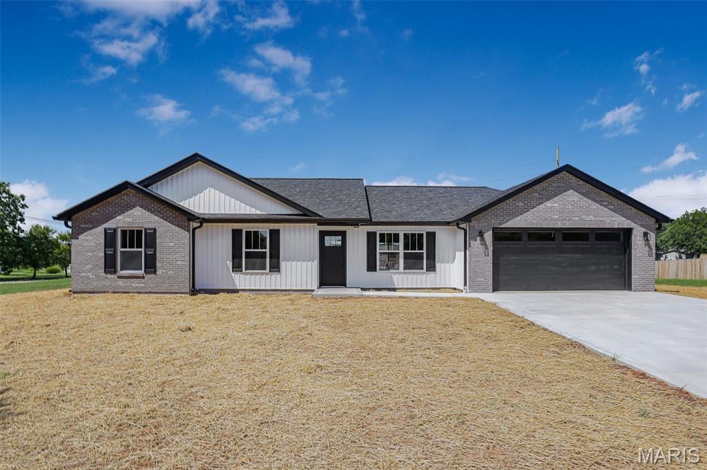 Construction is complete on this 3 bed, 2 bath home on a large city lot. Featuring 2x6 exterior wall construction, an open main living space, laundry room, mud room, pantry, covered patio and an attached garage. This home is located on a dead-end street in an established neighborhood and move in ready!