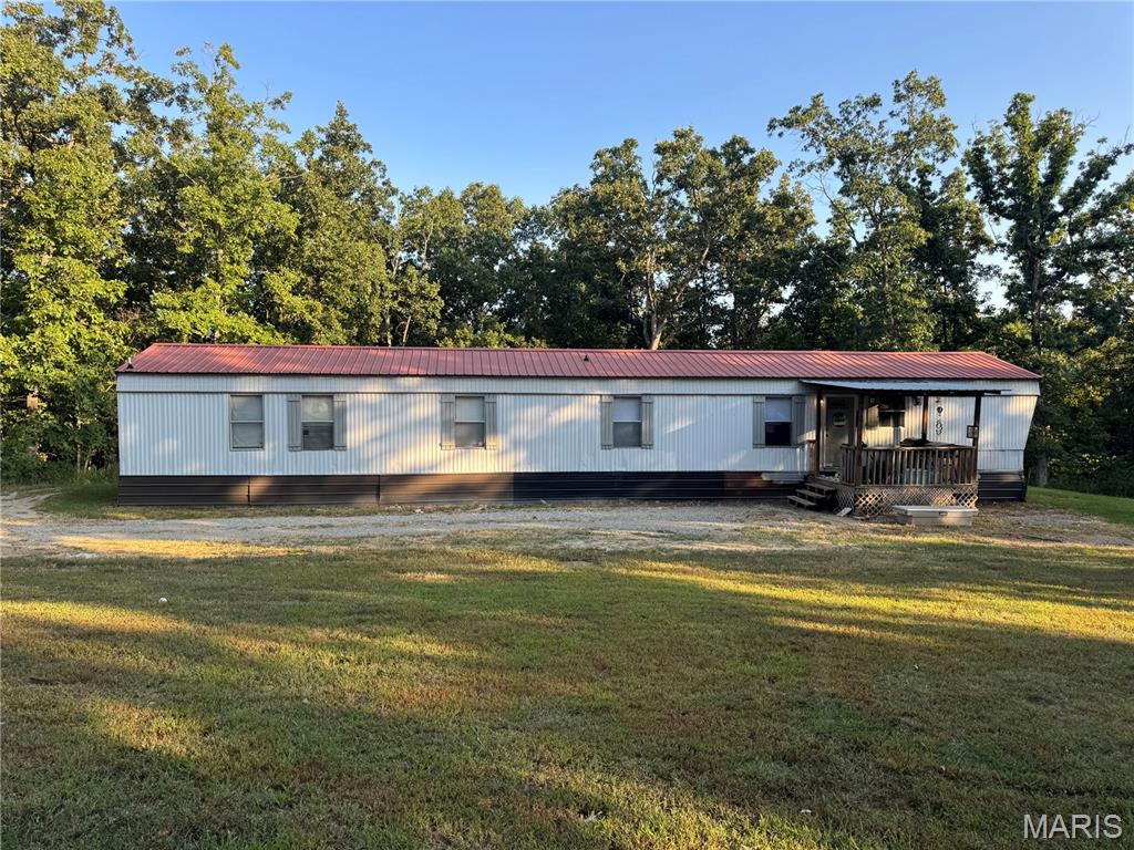 Looking for your own piece of private property with access to a private lake? This might be the place for you. This 5.4 acres includes a spacious 3 bedroom 2 bathroom mobile home just 5 miles from Fredericktown.  This property is part of the Lost Valley Lake association boasting of a beautiful 20 acre lake with a really nice doc and pavilion area. You would have access to kayak, fish, float and have lots of fun at this lake. Don't miss this opportunity!