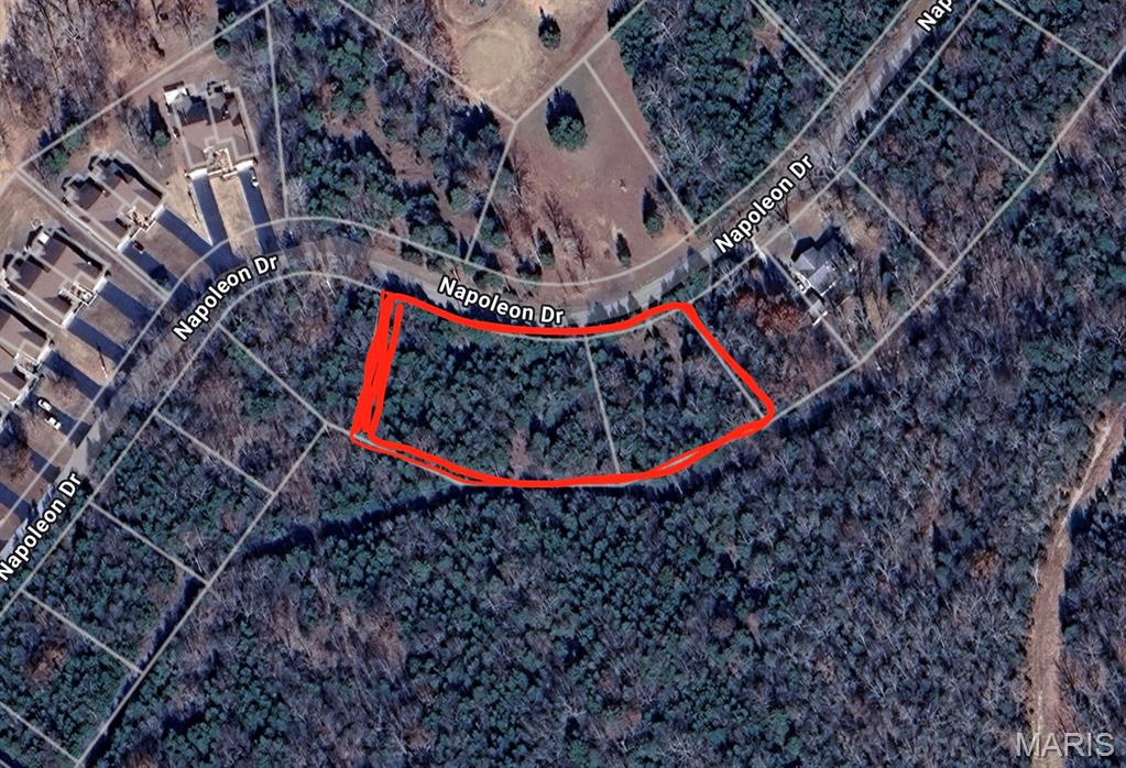 Rare opportunity to own three adjoining lots totaling over 1.15 acres in the sought-after Terre du Lac community! This unique parcel offers the space and flexibility that is hard to find within the subdivision, making it ideal for building your dream home or creating a private retreat.

One of the standout features of this property is its location directly across the street from the Terre du Lac golf course—offering the convenience of simply walking out your front door and heading straight to the course.

The property also provides exceptional privacy, backing to nearly 75 acres of wooded ground, creating a peaceful, natural setting with abundant wildlife and scenic surroundings. With mature trees and an undeveloped landscape, you have the freedom to design and position your home exactly how you envision.

Located within Terre du Lac, you'll enjoy access to a wide range of amenities including 16 lakes, boating, beaches, golf, tennis courts, and more, all while being just a short drive from Farmington and surrounding areas.

Whether you're looking to build now or invest for the future, this property offers a rare combination of space, privacy, location, and community amenities.