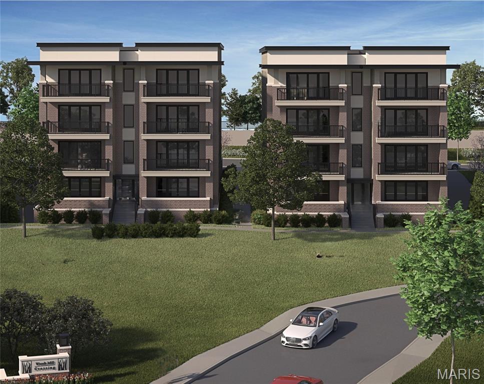 Upscale condominiums coming Town and Country at Woods Mill Crossing, debuting McBride Homes’ new Willow floorplan. BASE PRICE and PHOTOS are for 2BR, 2.5BA Willow. These elegant 2- and 3-bedroom condos feature 2.5 baths, open-concept living, spacious laundry area, and 9ft ceilings. The modern kitchen includes a large center island & flows seamlessly into the living area—ideal for both relaxing & entertaining. Enjoy private outdoor space w/spacious balconies off the living room & primary bedroom, while first-floor residences offer private terraces. Elevator-accessible buildings feature secured lobbies, underground parking, & only two residences per floor for added privacy & convenience. Experience low-maintenance living surrounded by beautiful green space & walkable site, ideally located near I-64 & Hwy 141 w/quick access to shopping, dining, and more. Pricing will vary based on interior selections. Backed by McBride Homes’ 10-year builder warranty & exceptional customer service.