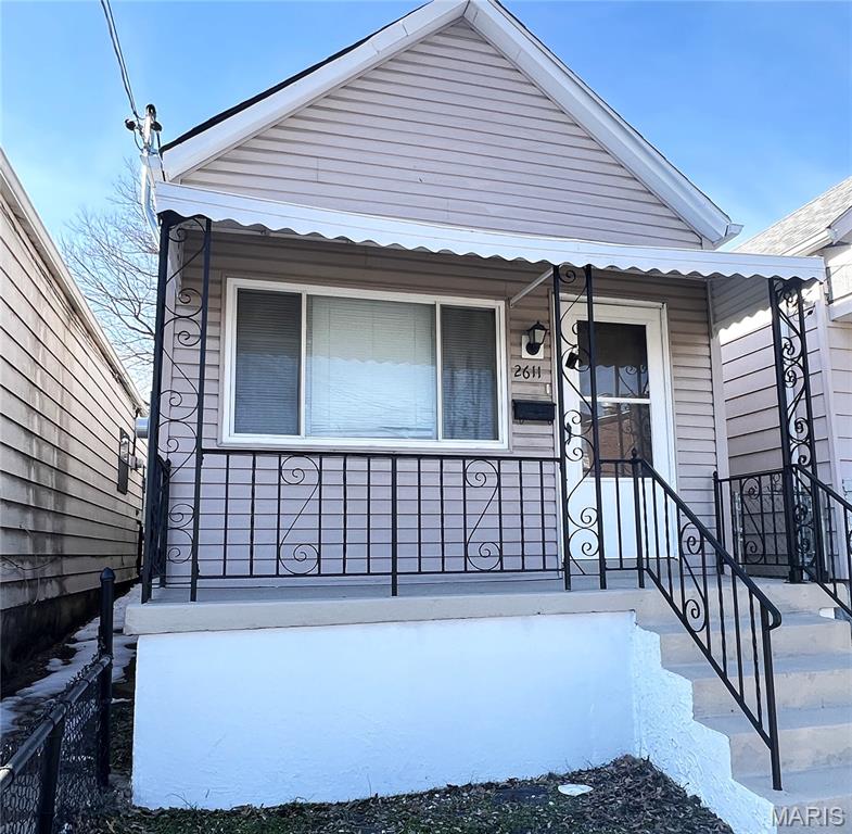 Welcome to 2611 Brannon Ave in the highly desirable Southwest Garden neighborhood, ideally located right next to The Hill and very close to The Grove and the Central West End with quick access to I-44 and I-64. This location remains consistently popular for its walkability, convenience, and classic South City character. This traditional South City shotgun-style home features one walk-through bedroom and one private bedroom in the rear. Recent updates include new vinyl flooring throughout, a fresh coat of paint, and a new electrical panel, making it move-in ready. Low maintenance living is a standout feature. The home has vinyl siding, a fully concrete backyard with no grass to mow, and a small front garden bed that could easily be converted to lawn if desired. If you have been looking for a place where you do not even need to own a lawn mower, this may be the one. At this price point, ownership may be more affordable than renting. This is a great opportunity for a first-time buyer, someone looking to downsize, or an investor seeking a solid rental in a strong location. Property is being sold as-is. Seller will not provide repairs or credits. Buyer is encouraged to complete any desired due diligence prior to submitting an offer. Seller will not consider offers containing inspection contingencies. Please submit offers on a Special Sale Contract. For added peace of mind, seller will provide a home warranty of the buyer’s choice up to $600.