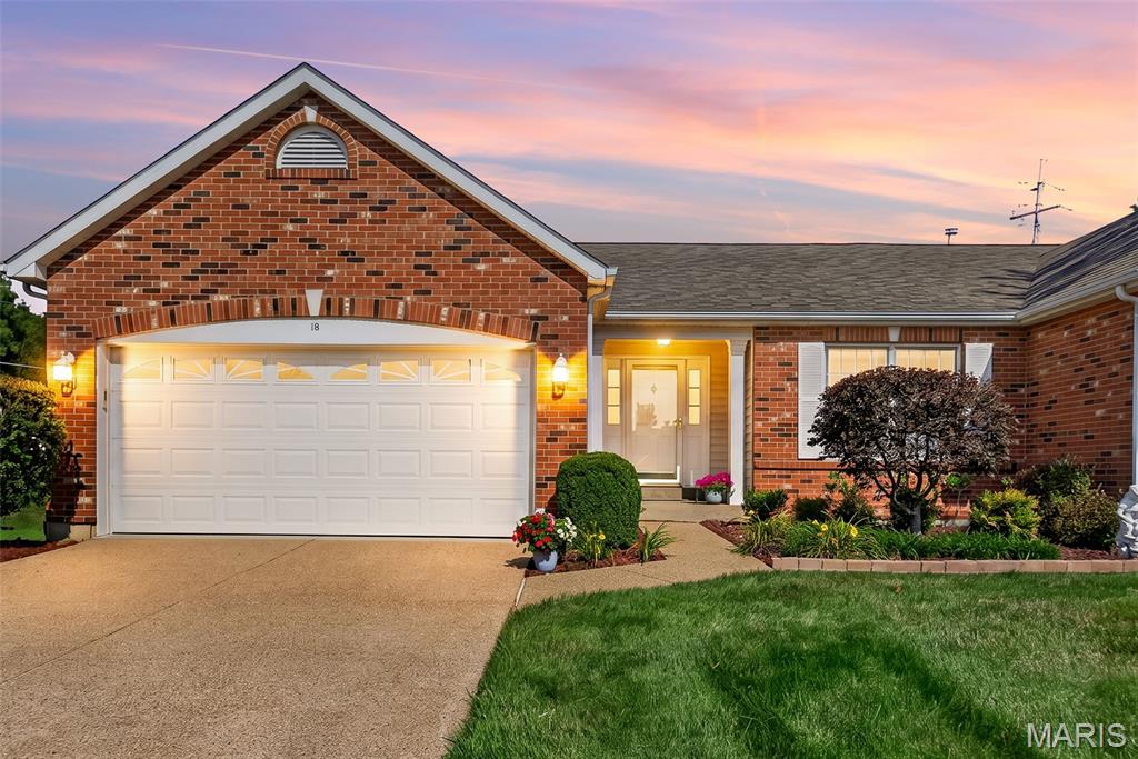 Welcome home to this beautifully maintained brick ranch villa tucked away on a quiet cul-de-sac in one of O'Fallon's most desirable golf course communities! Designed for easy, carefree living, the HOA takes care of lawn care, landscaping, and snow removal so you can spend more time enjoying the neighborhood amenities, including a pool, tennis courts, pavilions, picnic areas, and community golf course.
Inside, wood laminate flooring flows throughout the main level, where vaulted ceilings and skylights create a bright, open feel. The spacious living room features a large bay window and opens seamlessly to the dining area and kitchen, making it perfect for everyday living and entertaining. The kitchen is move-in ready with stainless steel appliances (refrigerator included), tile backsplash, under-cabinet lighting, soft-close cabinets and drawers, and plenty of workspace. The dining area offers a bay window with a door leading to the backyard deck.
The private primary suite features a bay window, walk-in closet, and en suite bath with a soaking tub and separate shower. A desirable divided bedroom floor plan places the second bedroom and full bath on the opposite side of the home for added privacy. You'll also appreciate the convenience of the main floor laundry, and the washer and dryer stay with the home!
The finished lower level provides exceptional additional living space with a large rec room, full bathroom, versatile flex room ideal for a home office, workout space, or guest sleeping area, plus a large storage closet with an organized shelving system.
Complete with a 2-car attached garage and an unbeatable location just minutes from Highways 364 and 40/61, this move-in ready villa offers the perfect combination of comfort, convenience, and low-maintenance living. Schedule your private showing today and discover everything this exceptional home has to offer!