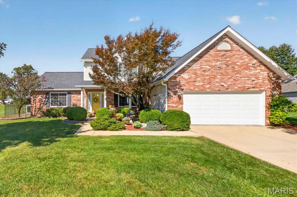 WELCOME HOME to this stunning 3-bedroom, 3.5 bathroom retreat nestled in a rural quiet neighborhood perfectly situated between Columbia and Waterloo. The main level boasts a grand two-story foyer, a spacious vaulted ceiling living room, a gourmet kitchen featuring custom white cabinetry with crown molding, granite countertops, breakfast bar, breakfast room and a walk-in pantry, a main level laundry room with quick access to the 2-car garage, half bathroom and formal dining room with tray ceilings. Retreat to the main-floor primary suite with its oversized vanity, soaking tub, separate walk-in shower and spacious walk-in closet, while the upper level offers two additional bedrooms, a full bath and a versatile loft that overlooks the living room. The lower level is an entertainer's dream, complete with a large family room, a custom wood bar, recreation area, a dedicated exercise room, a full bathroom and two large storage rooms. Step outside to your backyard oasis, featuring an in-ground pool, expansive patio space - some covered, a putting green, a fire pit, a sand area and turf all surrounded by beautiful landscaping and black aluminum fencing. Outside the fenced area, you will walk into a large backyard with small tool shed. With quick access to Route 3 and a short 20-minute drive to downtown STL, this home offers the perfect balance of luxury, recreation, and convenience!