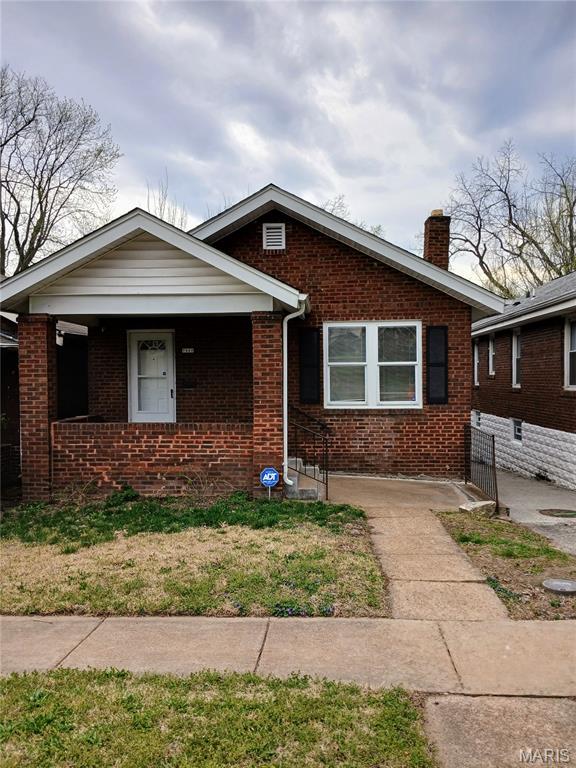 Great opportunity for a First Time Home Buyer, Downsize, Family, or Investor. Newer Windows and Brand New Roof. Enjoy the large porch at the front of the home for a copy of coffee in the morning. Beautiful Hardwood Floors throughout. Spacious Living and Dinning Area with ample natural light. Kitchen is at the back of home with great view of the backyard. Several cabinets, long counter space, and appliance stay with property. Two Bedrooms with remodeled full bath finish off the Main Level. Full Basement with some room separation. Great storage, very clean, and dry. Venture out to the backyard which hosts a spacious deck great for entertaining. Yard is fully fenced and slightly slopes away from the house. Plenty of space to run and play. Concrete pad for picnics or storage shed. Shared drive with the home to the right.