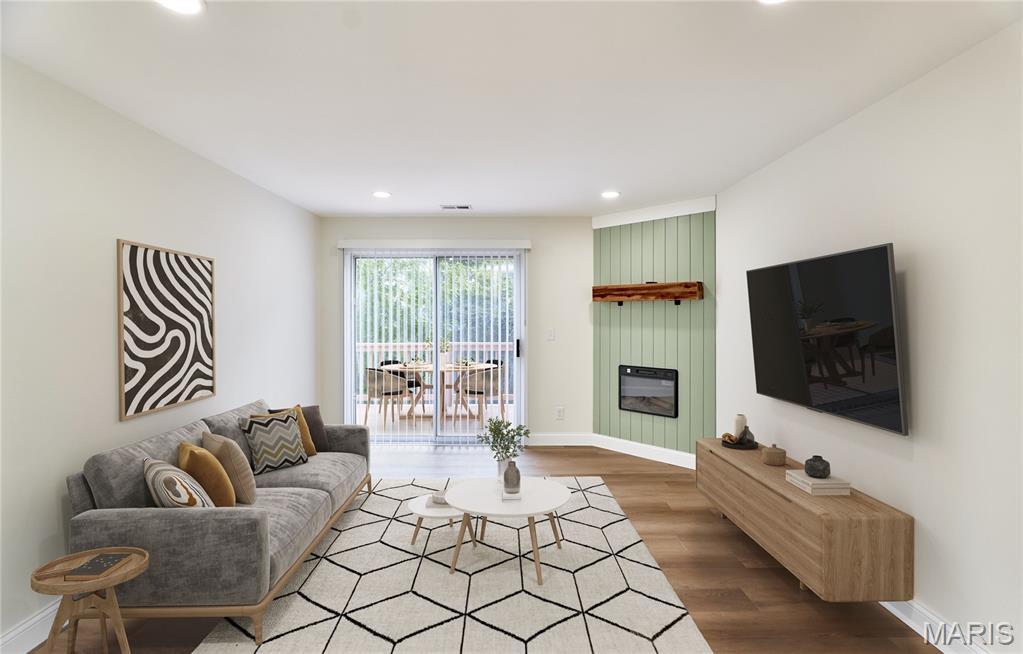 Move in, unpack, and start enjoying your new home from day one! Thoughtfully renovated from top to bottom, this beautifully updated 2-bedroom, 1-bath home combines modern style, energy-efficient upgrades, and low-maintenance living in one of St. Peters' most desirable locations.

The bright, open floor plan welcomes you with durable luxury vinyl plank flooring throughout the main living areas, while both bedrooms feature soft new carpeting for added comfort. The inviting living room is centered around a beautiful electric fireplace that provides both warmth and cozy ambiance, creating the perfect place to relax after a long day.

The stunning new kitchen is designed with both style and function in mind, featuring new cabinetry, quartz countertops and a full suite of stainless steel ENERGY STAR appliances, including the range, microwave, dishwasher, refrigerator, washer, and dryer. With the major updates already completed, you can simply move in and enjoy your new home.

Step outside to your private deck overlooking peaceful common ground—an ideal spot to enjoy your morning coffee, unwind in the evening, or entertain family and friends. The home also includes one covered carport parking space plus one additional assigned parking space for added convenience.

Whether you're purchasing your first home, downsizing, or searching for a truly move-in-ready property, this exceptional home offers the perfect combination of comfort, style, convenience, and value.