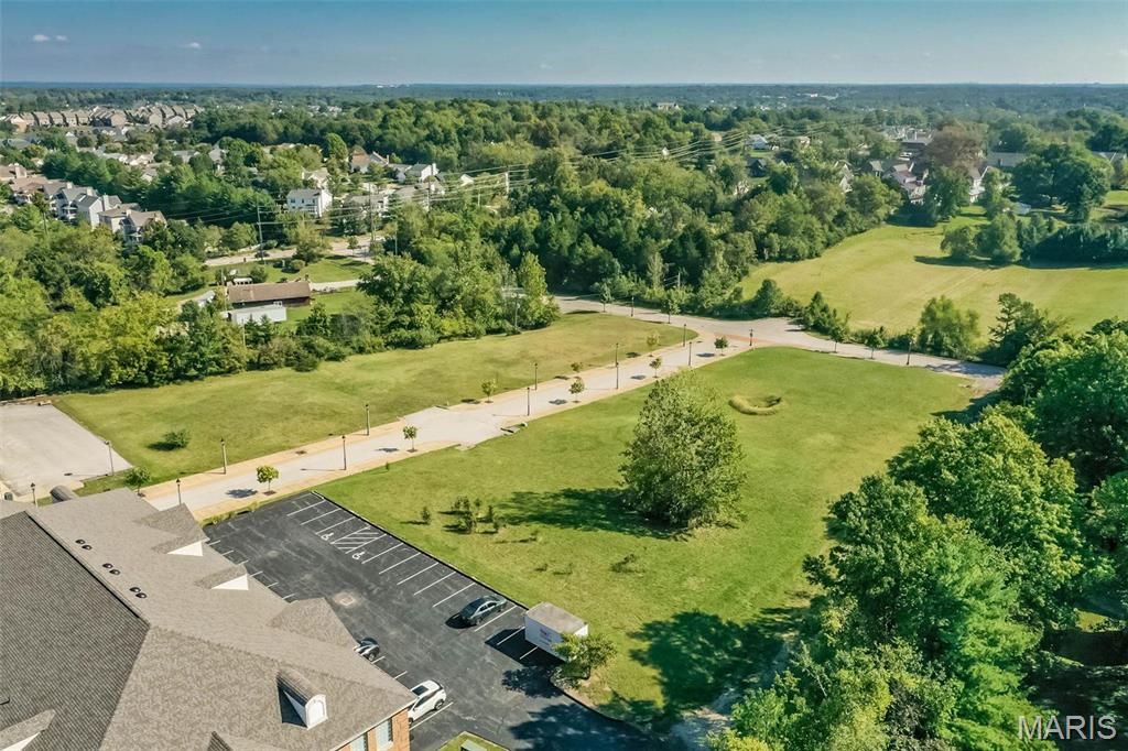 The property includes 4 parcels. The tax IDs are 24V4200351, 24V420313, 24V420340, 24V420331. Please see supplements for Preliminary Development Plan and Marketing Flyer.
The property is Zoned Residential R-6 in the Wildwood Town Center District.
Utilities are available for each lot, along with underground storm water detention.
Additional parking is available on the adjacent office building parking lots.
Located minutes away from Wildwood YMCA, Town Center and numerous Shops and restaurants. Additional Rooms: Other