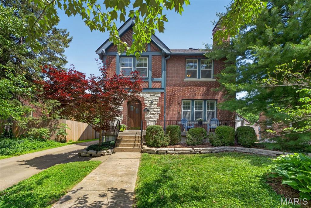 Charming classic Tudor in the heart of highly sought-after University Park! This timeless home welcomes you with a charming front porch, original wood front door, and beautiful hardwood floors throughout. Inside, you’ll find an inviting entry foyer, arched doorways, crown molding, and a cozy wood-burning fireplace and custom bookshelves that add to the home’s character and warmth.The spacious dining room is perfect for gatherings, while abundant picturesque windows fill the home with natural light. The updated kitchen features granite countertops, a 5-burner gas stove, and a convenient butler’s pantry for added storage and functionality.The main level also includes a convenient half bath. Upstairs offers three bedrooms and a full bath on the second level, PLUS a flexible fourth bedroo on the third floor—ideal for a home office, guest suite, or playroom. Enjoy outdoor living on the newer back patio overlooking a fully fenced backyard with an automatic gate for added privacy. Additional highlights include a new detached 2-car garage, some newer windows, dual-zoned HVAC systems (main floor HVAC new in 2025, second floor HVAC 2015), new boiler (2020), water softener (2024), and water heater (2017). Roof replaced in 2021. All of this in a fantastic location just steps from parks, shops, and restaurants—perfect for walkable, vibrant living!