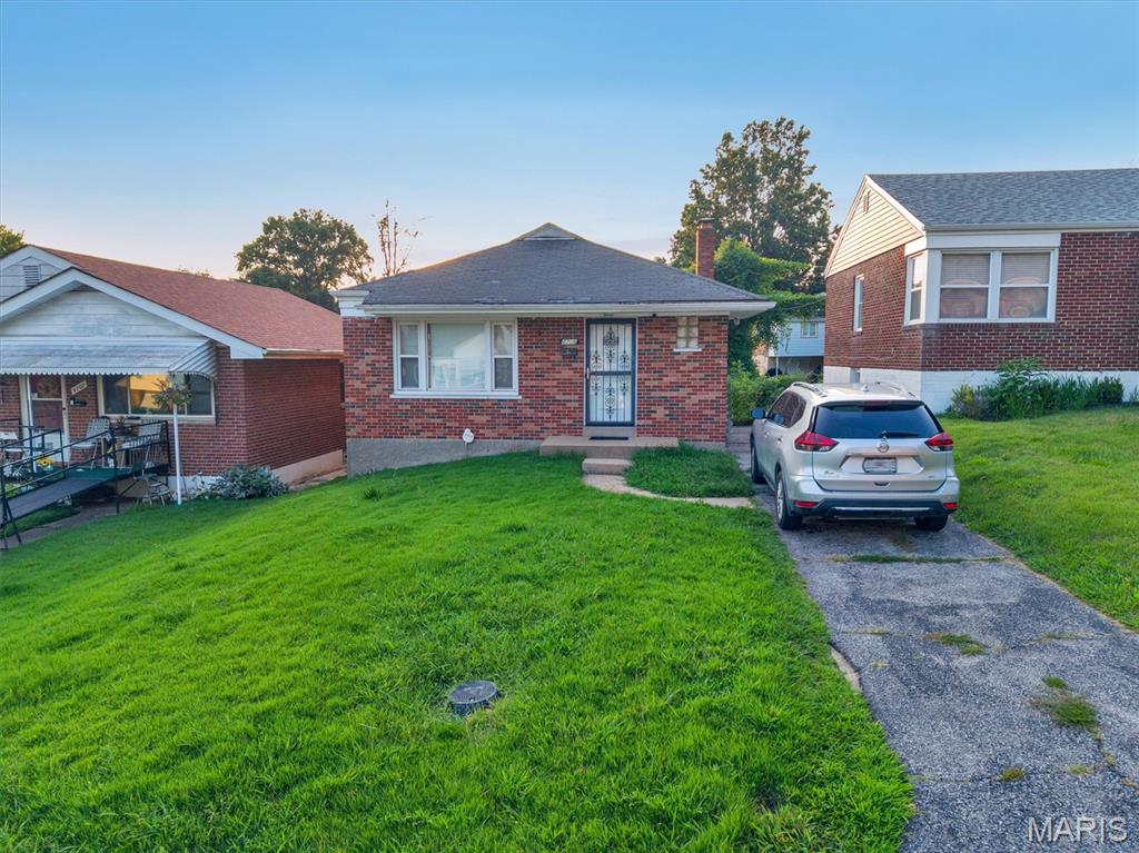Excellent investment opportunity with a well established and well paying tenant who has been here since 2019 and is locked in through March of 2027. They pay all utilities (sewer up to a certain amount) and landscaping so your expenses are limited to insurance and taxes. Interior photos can be provided upon request. Low expenses and high cash flow opportunity with tenants paying all utilities outside of sewer for a certain amount. Sits on the corner of a quiet street. This house is minutes away from the Normandy shopping center (St. Louis county workforce, social security admin, Rent One, City Jump Family Entertainment Complex, etc.). Easy access to I-70 and get downtown within 20 min, Earth City within 15, and the airport in less than 10. Perfect rental for UMSL university students too. This is part of a 13 unit single family portfolio sale all located around this area and at this price point. Can be sold individually or with the rest - See Supplements.