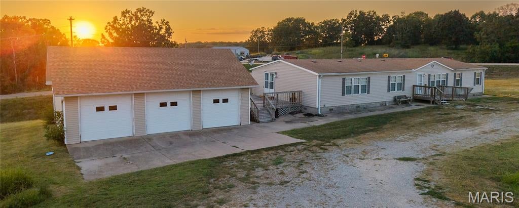 This is the CHILD listing at TJ's Hickory Restaurant (building). Included in the sale of the property(2.5 acres) is a residential 3 BD/2 BA detached garage, 2003 DW. Foundation is concrete block; new roof on the garage; main bath has a new floor and toilet. Large pantry, large walk-in primary closet, built-ins. LR, gas fireplace, and more.
RV or mobile home hook-up. US 160 Highway frontage.
The building would make a great flea market, car lot, office space, auction house, landscape, trailer sales- endless possibilities.